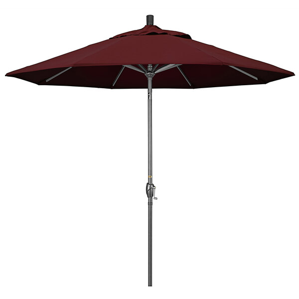 A close-up of a burgundy California Umbrella with a hammertone aluminum pole.