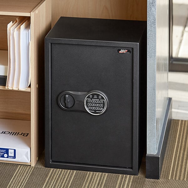A black steel security safe with an electronic keypad lock.