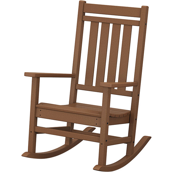A brown POLYWOOD rocking chair with armrests and a wooden seat.