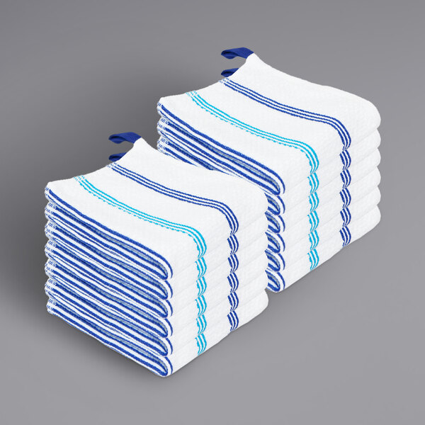 A stack of navy blue and white Monarch Brands Premier terry dish cloths.