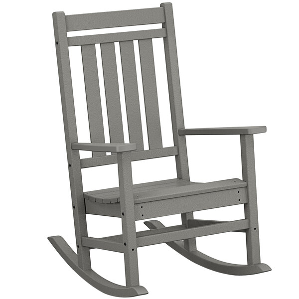 A POLYWOOD slate grey rocking chair with armrests.