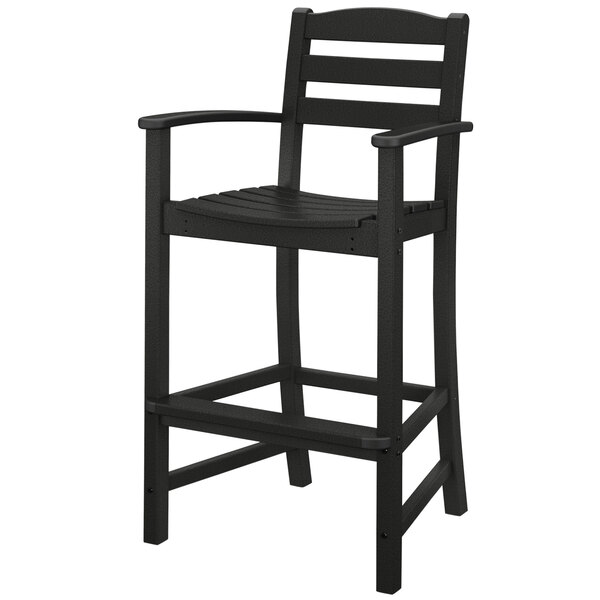 A black POLYWOOD outdoor restaurant bar stool with armrests.