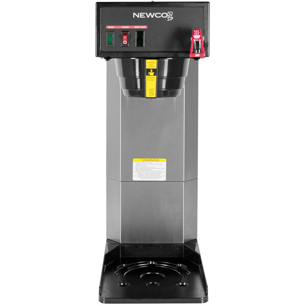 A Newco airpot coffee brewer with a yellow label.