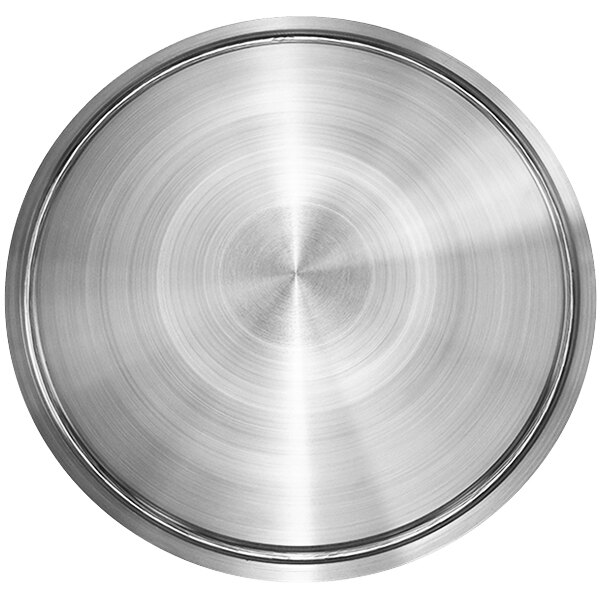 A stainless steel circular metal plate with a circular pattern on the surface.
