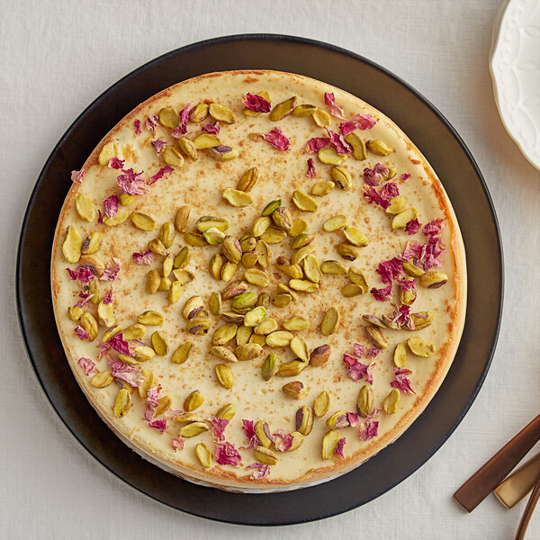 A cake with Regal Raw pistachio halves on top.