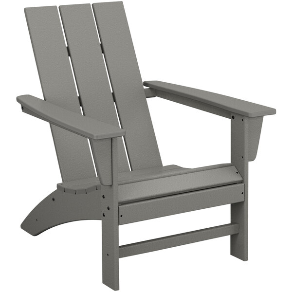 A POLYWOOD modern Adirondack chair in slate grey with armrests.