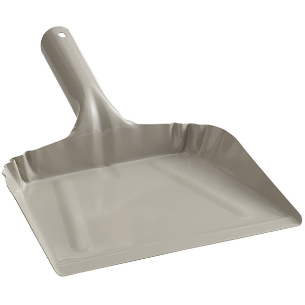 A grey steel Quickie dustpan with a handle.
