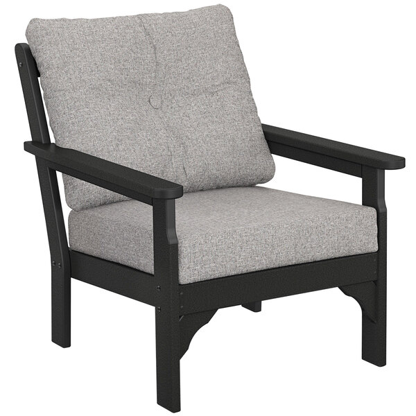 A black POLYWOOD Vineyard deep seating chair with gray cushions.