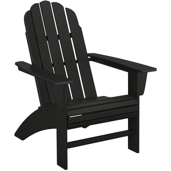 A black POLYWOOD adirondack chair with armrests.