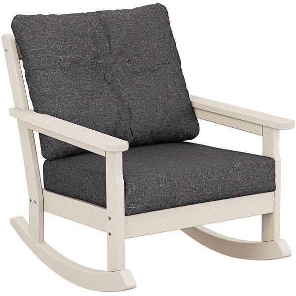 A white POLYWOOD Vineyard deep seating rocking chair with a grey cushion.