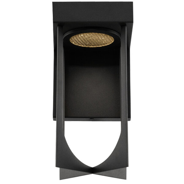 A black wall sconce with a gold circle on top.