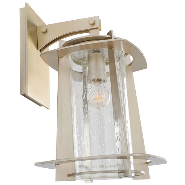 A Kalco Shelby medium wall sconce with clear glass shade on a white background.