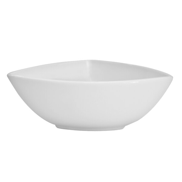 A CAC Triumph bright white triangular porcelain bowl with a handle.
