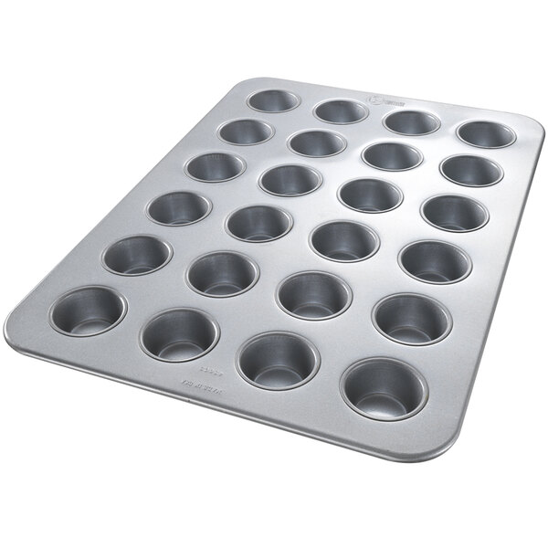 A Chicago Metallic muffin pan with 24 cups.