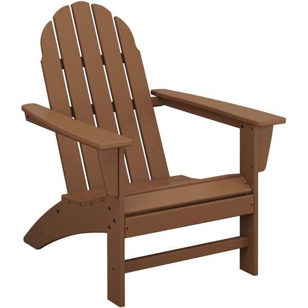 A brown POLYWOOD Vineyard Teak Adirondack chair with armrests.