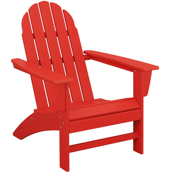 A red POLYWOOD Adirondack chair with armrests.