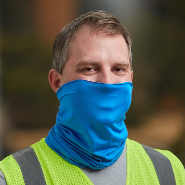 A man wearing a blue Ergodyne Chill-Its multi-band over his face.