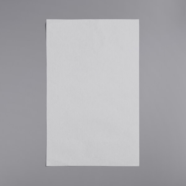 A white rectangle of filter paper.