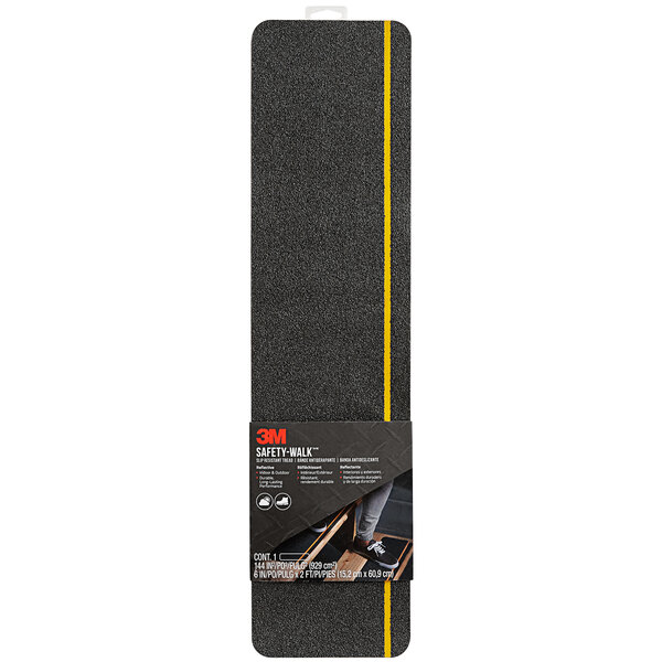 A black rectangular 3M Safety-Walk tread with yellow lines.