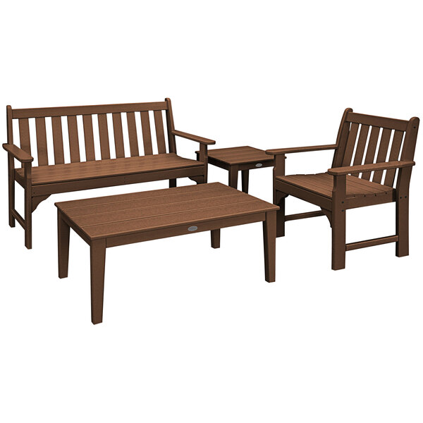A POLYWOOD teak bench and table set on an outdoor patio.