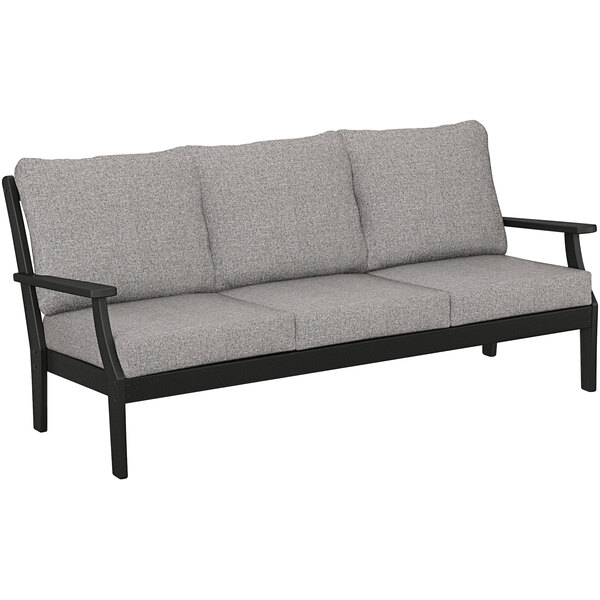 A black POLYWOOD deep seating sofa with grey cushions on a white background.