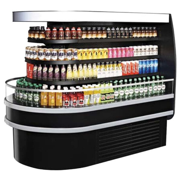 A Turbo Air stainless steel oval island display case with drinks displayed on a shelf.