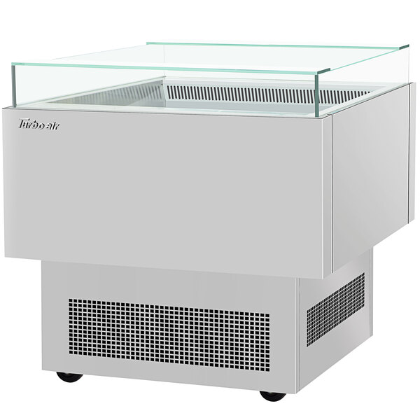 A white rectangular Turbo Air sandwich and cheese display case with a glass top.
