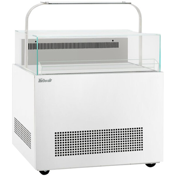 A white rectangular Turbo Air sandwich and cheese display case with glass doors and a vent.