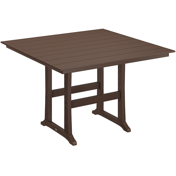 A POLYWOOD mahogany table with trestle legs.