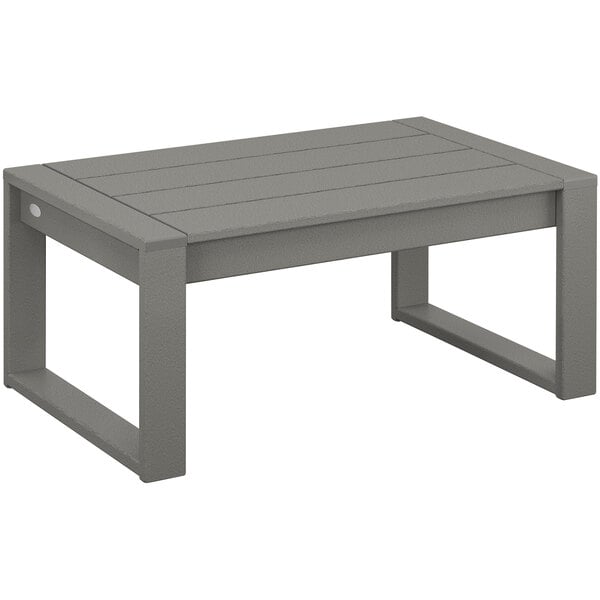 A POLYWOOD slate gray rectangular coffee table with legs.