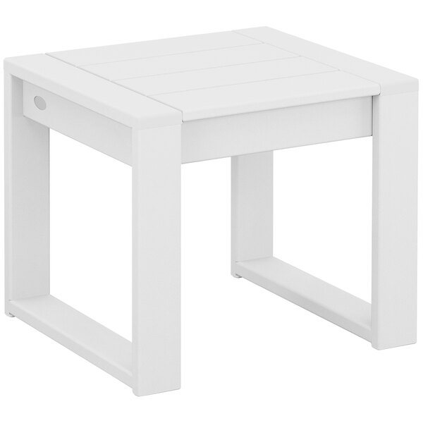 A POLYWOOD white end table with wooden legs.