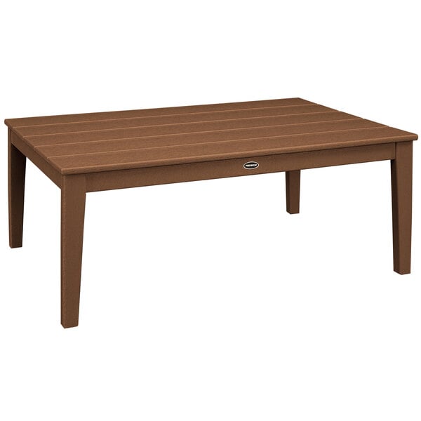A brown rectangular POLYWOOD outdoor coffee table with wooden legs.