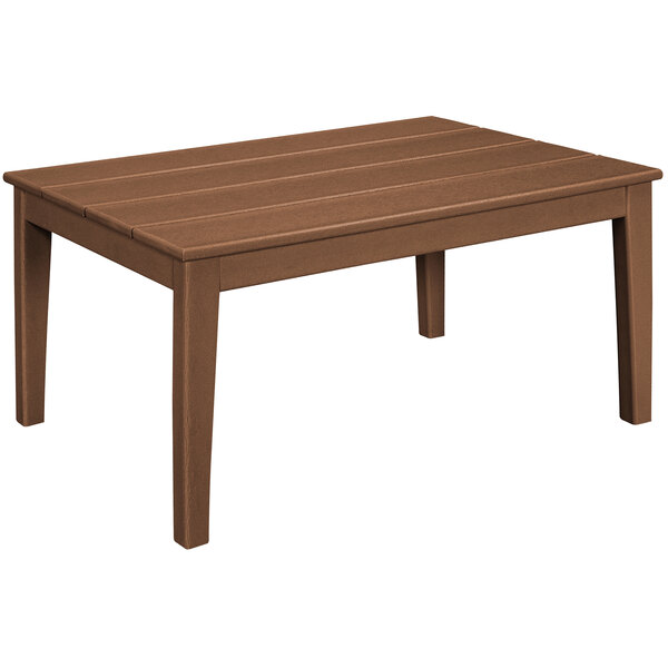 A brown POLYWOOD coffee table with wooden legs.