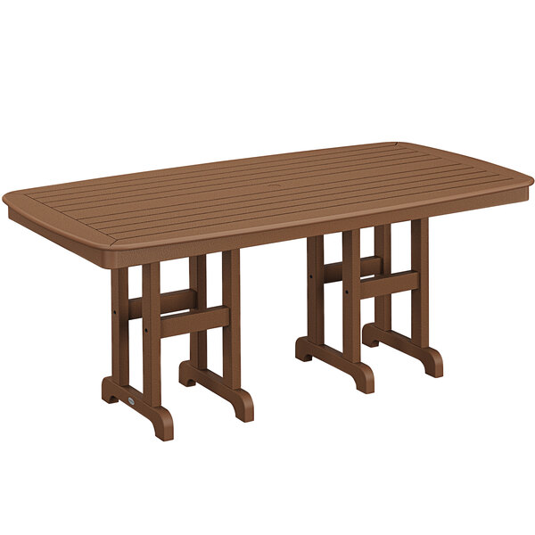 A teak POLYWOOD dining table on an outdoor patio.