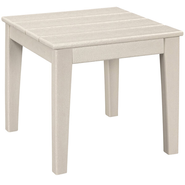 A white POLYWOOD end table with a wooden top on an outdoor patio.