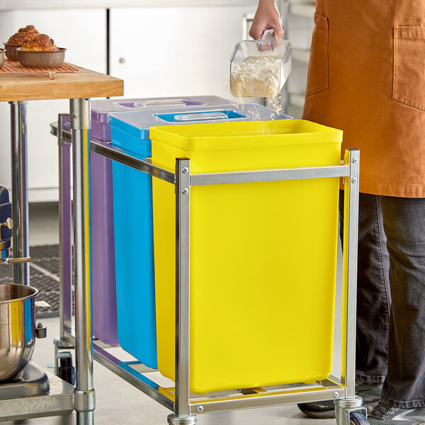 A yellow 10-gallon ingredient bin with a lid, designed for kitchen storage and organization.