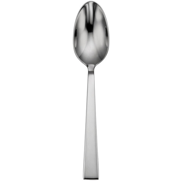 A close-up of a Sant'Andrea Fulcrum stainless steel oval bowl soup/dessert spoon with a long handle.