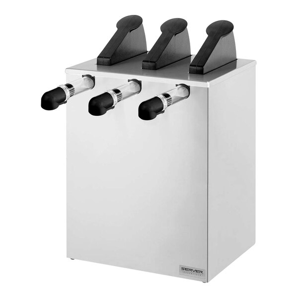 A white countertop box with stainless steel triple pump dispensers and black handles.