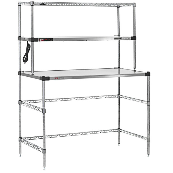 A white Metro Super Erecta workstation with a stainless steel heated shelf above a silver metal shelf.