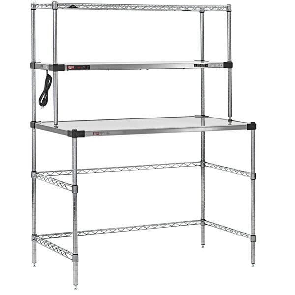 A Metro Super Erecta workstation with a stainless steel heated shelf and two shelves.