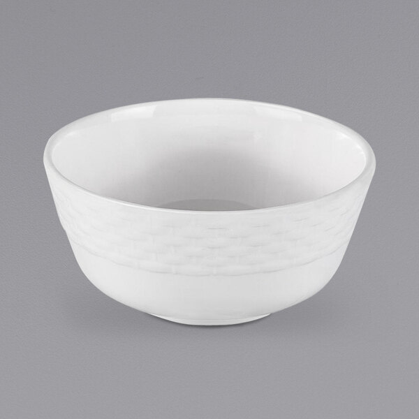 A white Bon Chef melamine bowl with a pattern on it.