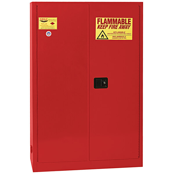 A red metal Eagle safety cabinet with yellow warning labels.