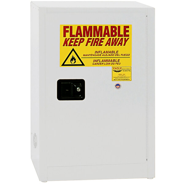 A white Eagle Manufacturing safety cabinet with a yellow flammable sign and self-closing door.