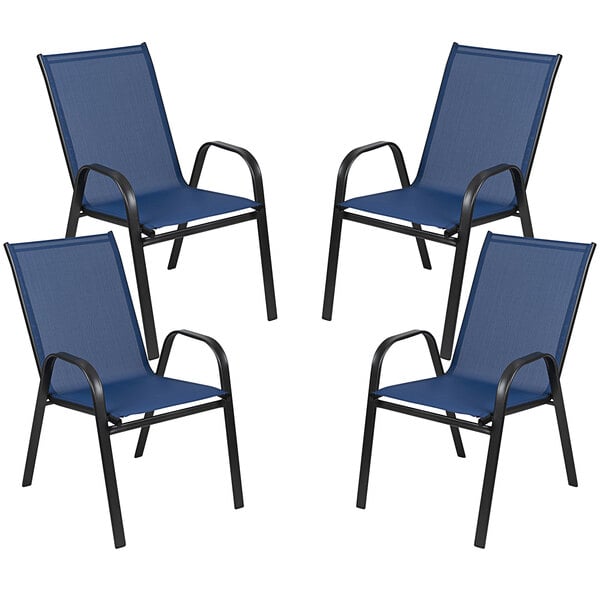 A group of four Flash Furniture navy outdoor chairs with blue arms and black legs.