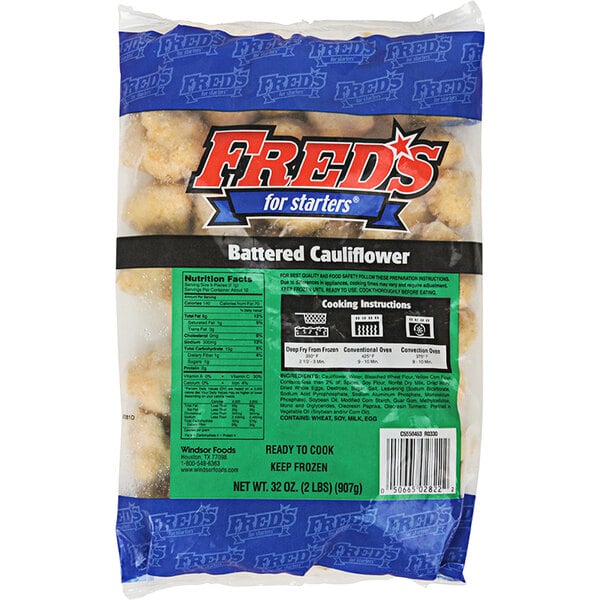 A case of Fred's Battered Cauliflower bags on a counter.