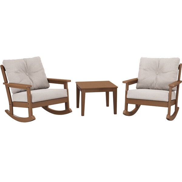 Two POLYWOOD Vineyard rocking chairs with Dune Burlap cushions and a brown square table.