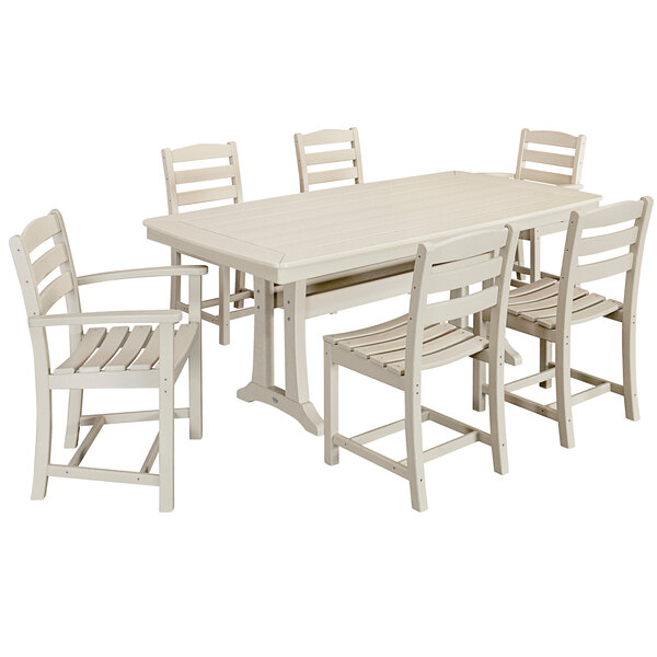 A white POLYWOOD dining table and chairs with a white background.