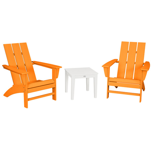 A white table with legs and two orange Adirondack chairs.