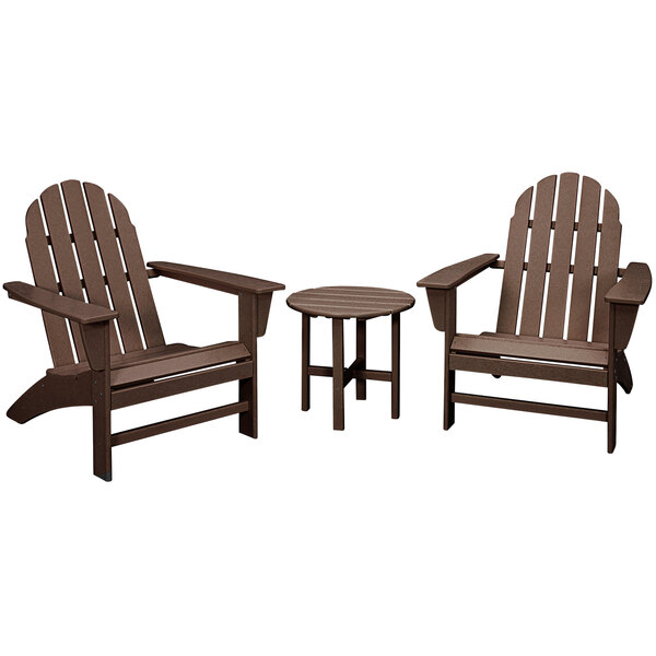 A round wooden table with a brown POLYWOOD Vineyard outdoor patio set of 2 Adirondack chairs.