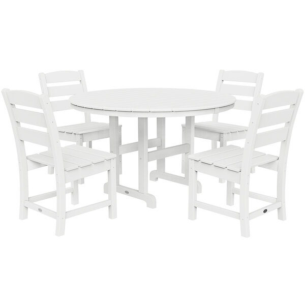A white POLYWOOD table with four chairs around it.